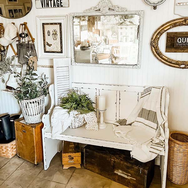 Distressed White Pew Bench in Entryway