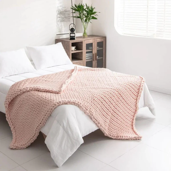 Zonli Blush Pink Chunky Weighted Blanket Draped on Bed